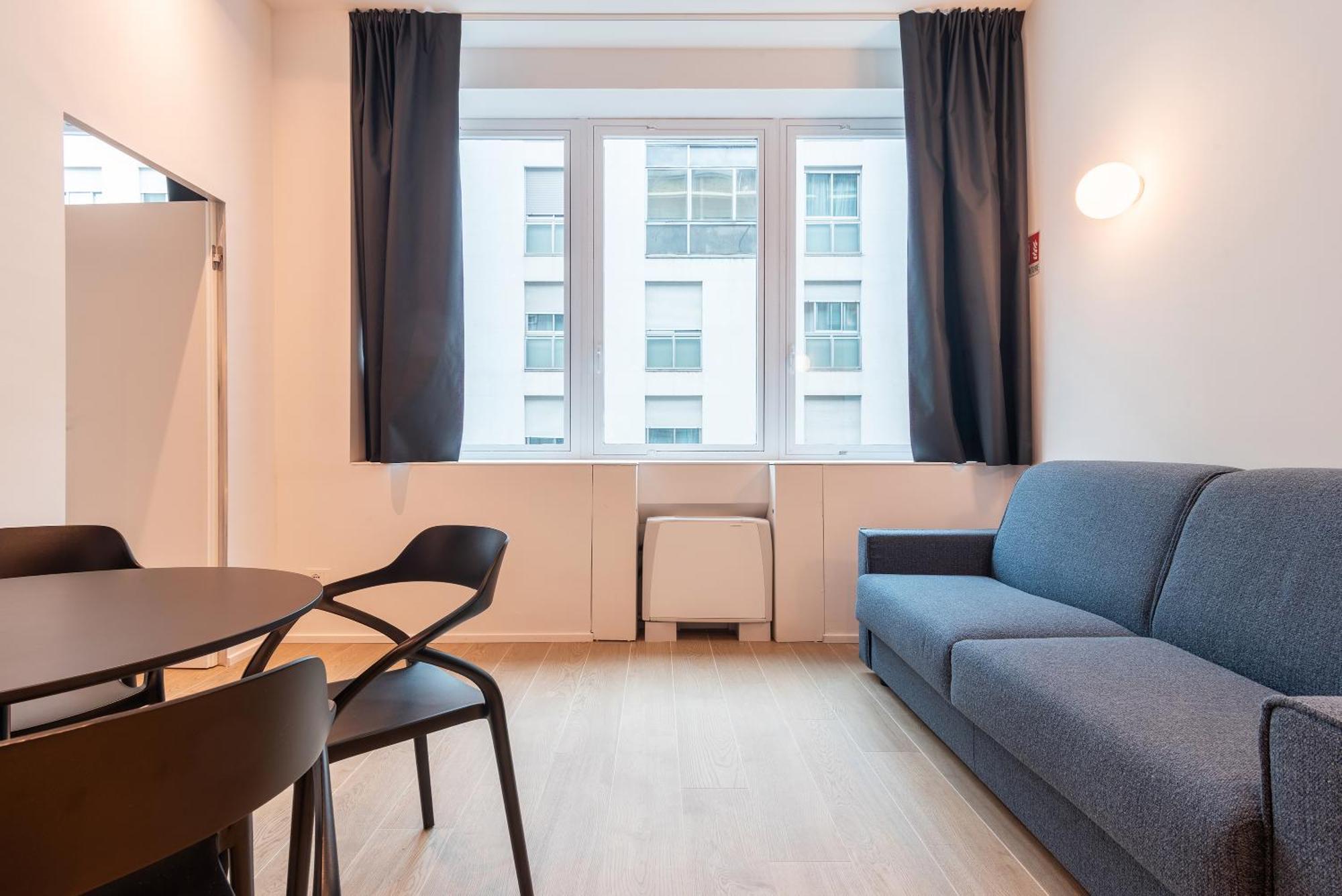 Easyhomes-City Centre Suites Милано Стая снимка
